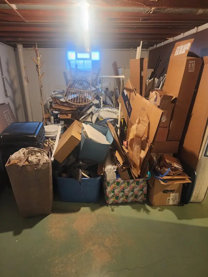 Roll-off dumpster container at job site for Yard Waste Dumpster Rental in Garden City